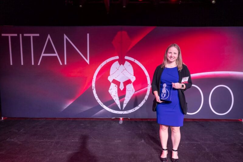 Lane Newsom, InfoWorks President, receiving Titan 100 award