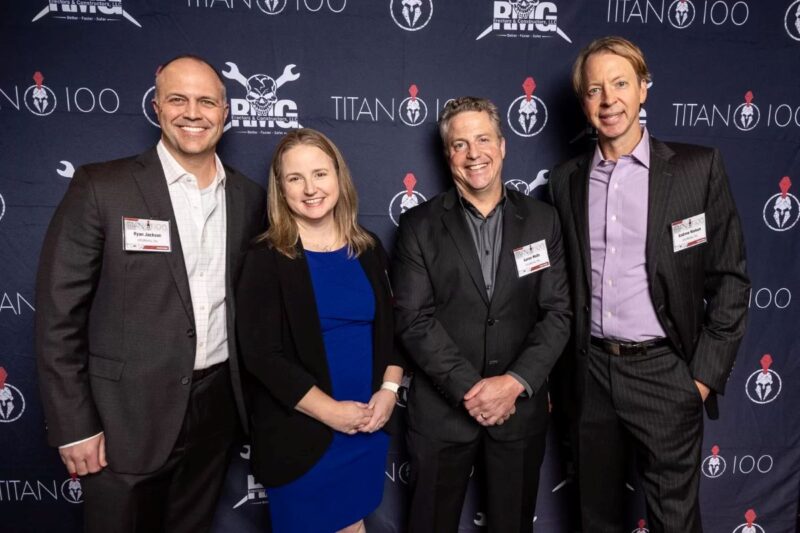Lane Newsom, InfoWorks President & Titan 100 Honoree at Titan 100 award ceremony with Ryan Jackson, Aaron Wells, and Andrew Nielson