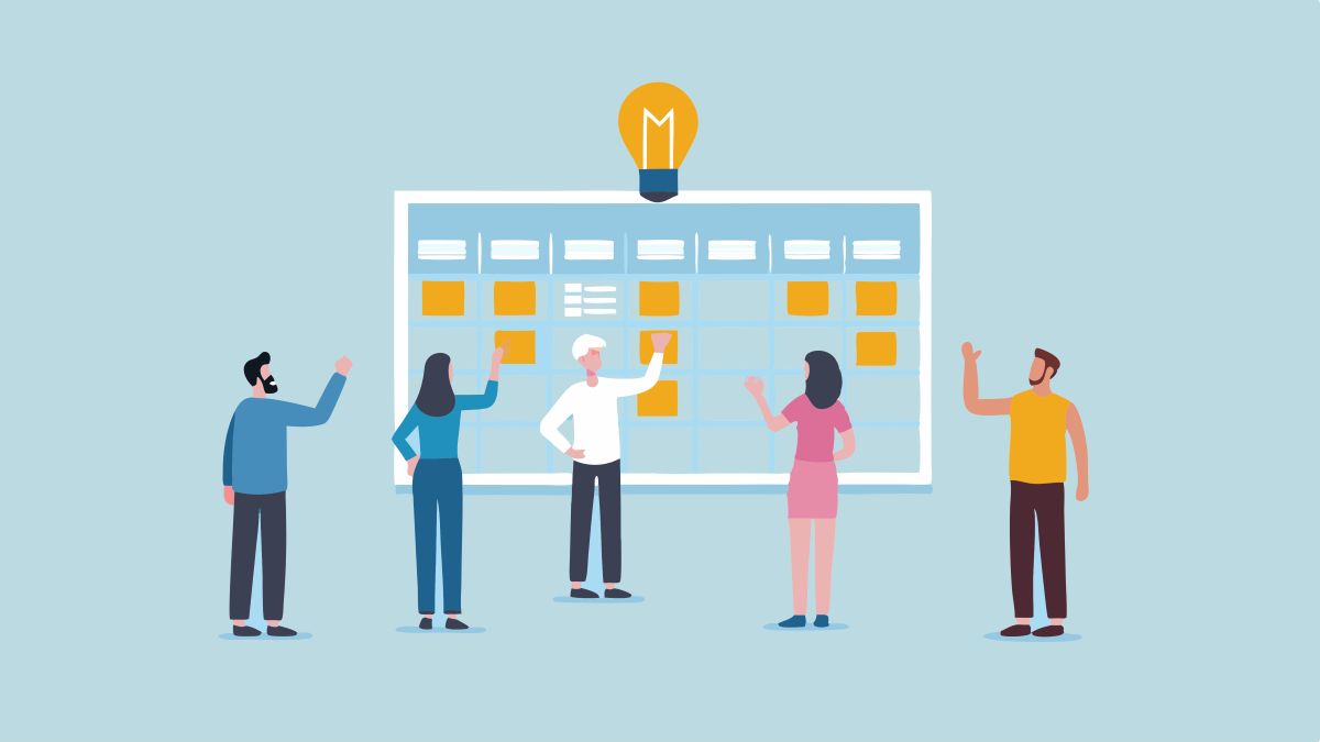 group of people collaborating around a idea board